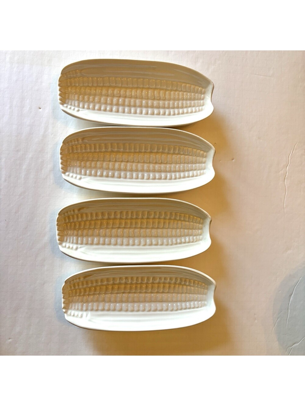 WHITE STONEWARE CORN ON THE COB HOLDERS SET OF FOUR